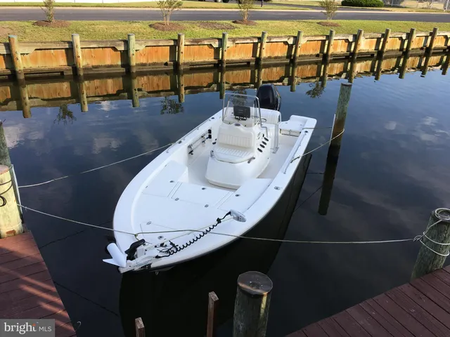 swimming pool view with a floor to ceiling window