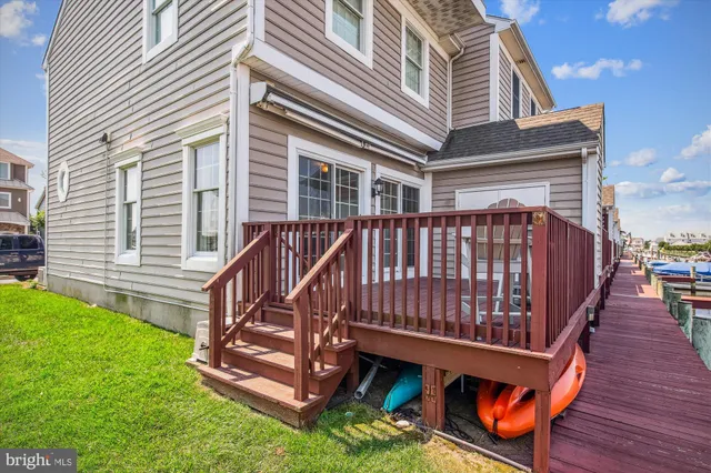 a view of a backyard with a deck