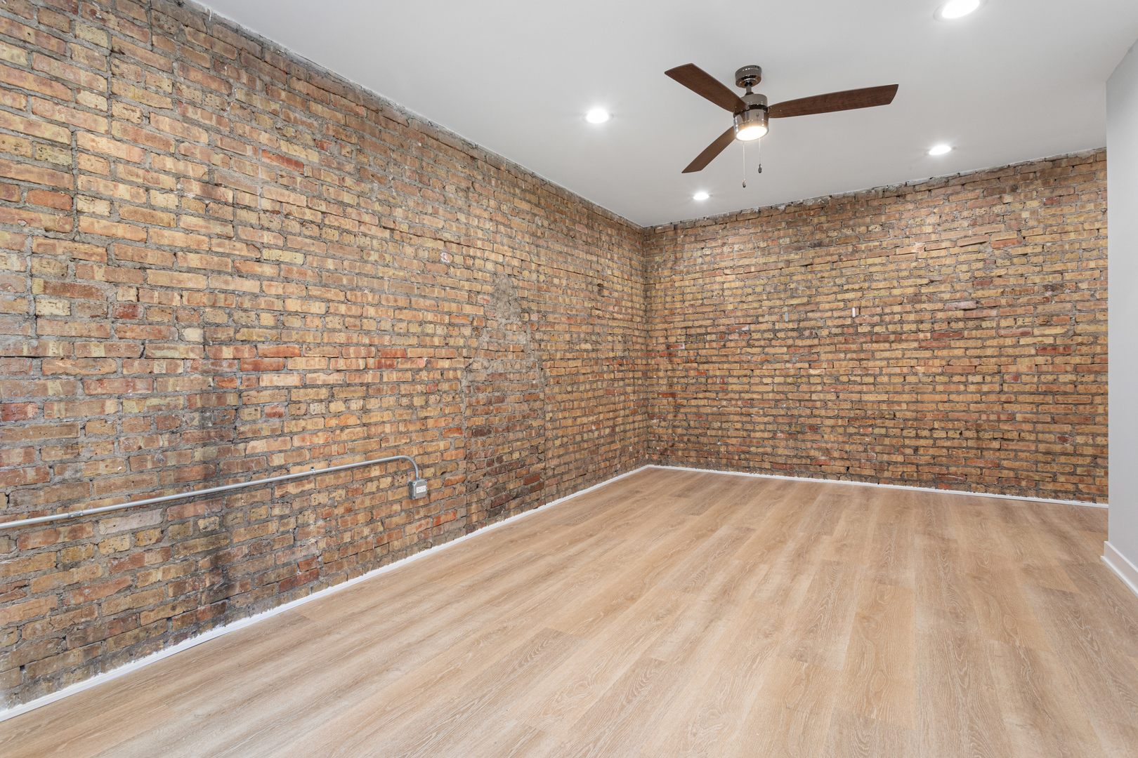 7381 North Damen Avenue, Unit 1E Chicago, IL 60645 - Photo 5 of 13 a view of empty room