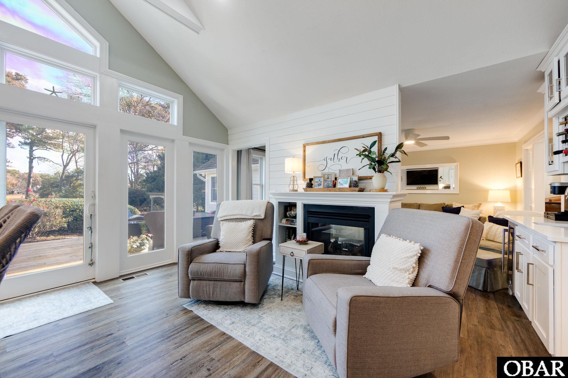 2017 Creek Road Kitty Hawk, NC 27949 - Photo 14 of 50 Kitchen Sitting Area and Fireplace