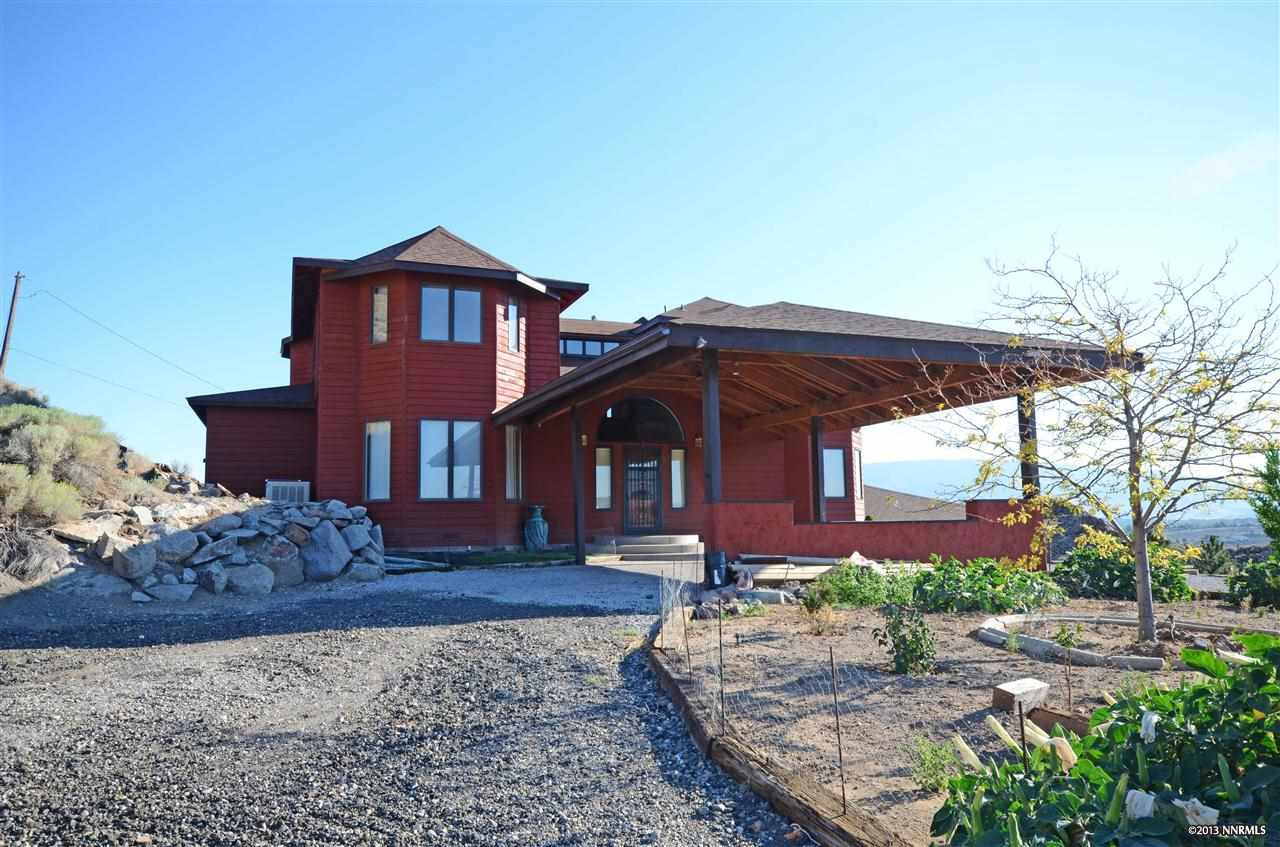 185 Silverstone Place Reno, NV 89512 - Photo 1 of 1 a front view of a house with a yard