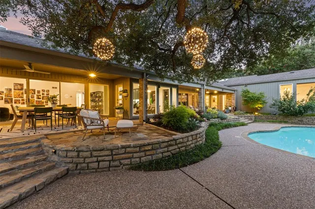 a backyard of a house with lots of green space