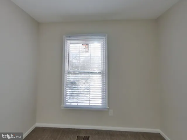 a view of a small space with a window