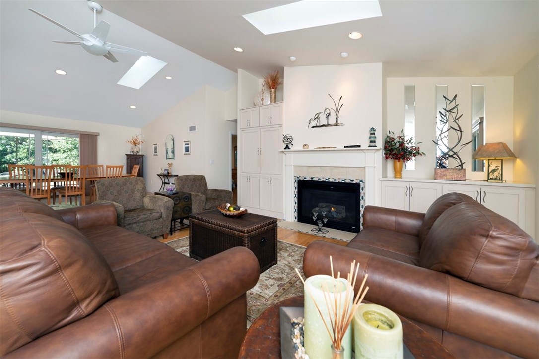 60 Walsh Road Charlestown, RI 02813 - Photo 6 of 27 Living room with Fireplace, built-ins and open to dining room