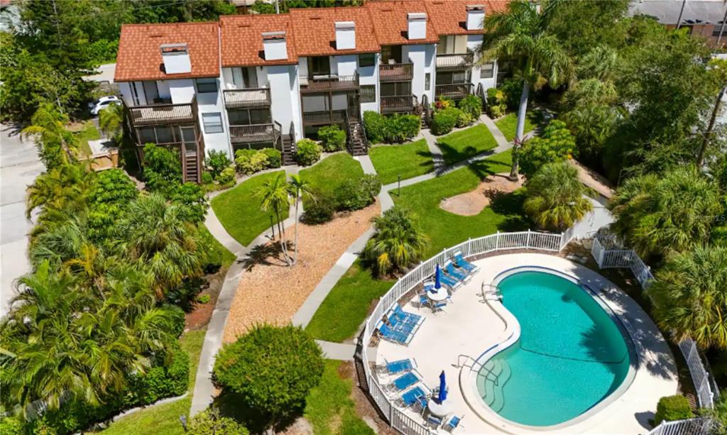 6840 Midnight Pass Road, Unit 6840 Sarasota, FL 34242 - Photo 4 of 66 an aerial view of a house having outdoor space