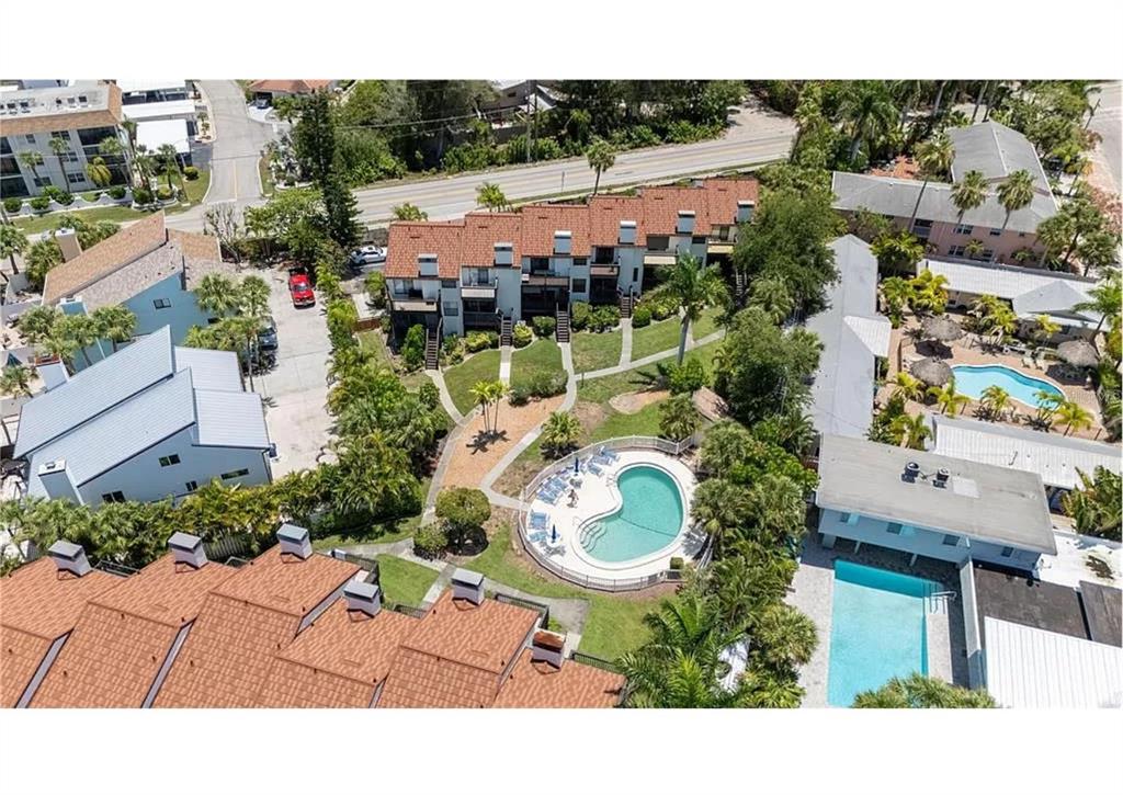 6840 Midnight Pass Road, Unit 6840 Sarasota, FL 34242 - Photo 66 of 66 an aerial view of house with yard swimming pool and outdoor seating