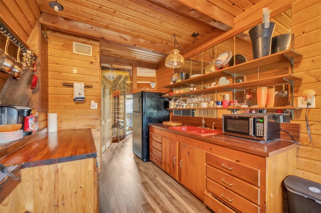 159 Catfish Trail Whitney, TX 76692 - Photo 14 of 36 a view of a porch with wooden floor