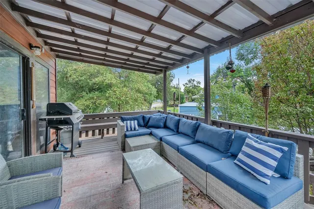 a outdoor living space with furniture and garden view