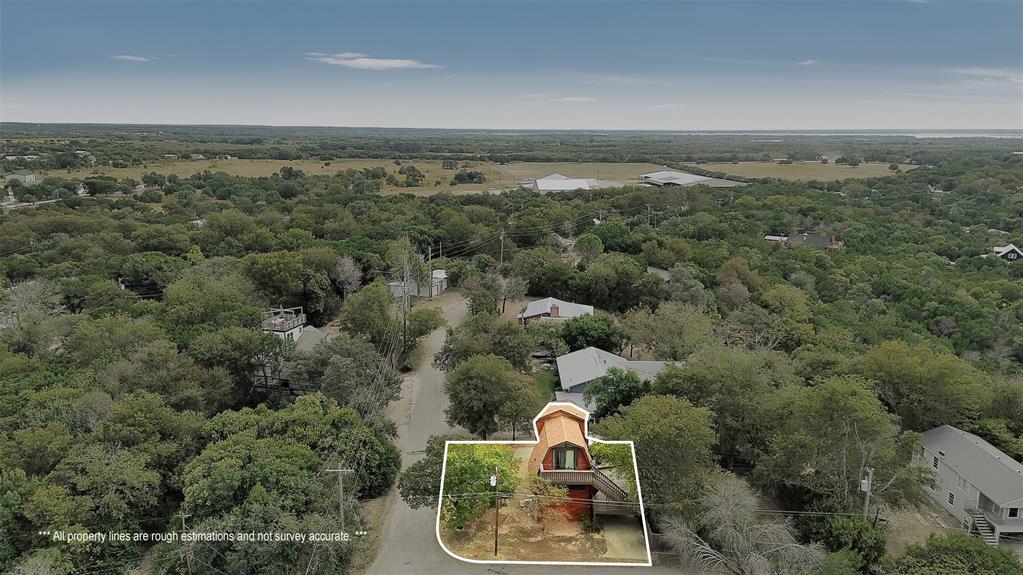 159 Catfish Trail Whitney, TX 76692 - Photo 30 of 36 an aerial view of a houses with a yard