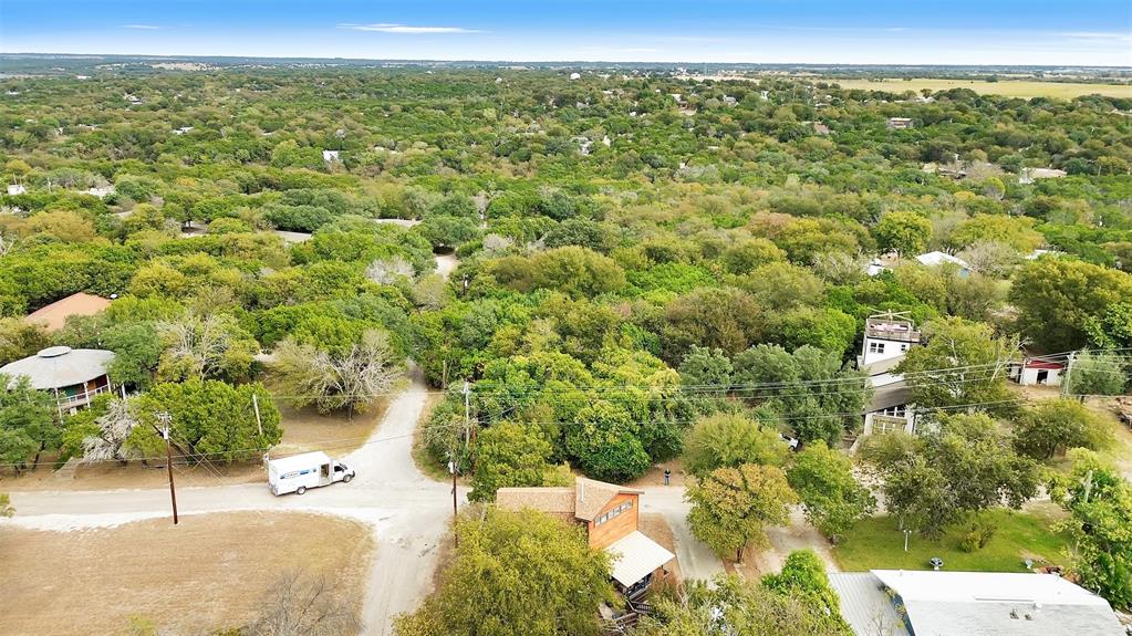 159 Catfish Trail Whitney, TX 76692 - Photo 31 of 36 a view of a yard with an outdoor seating