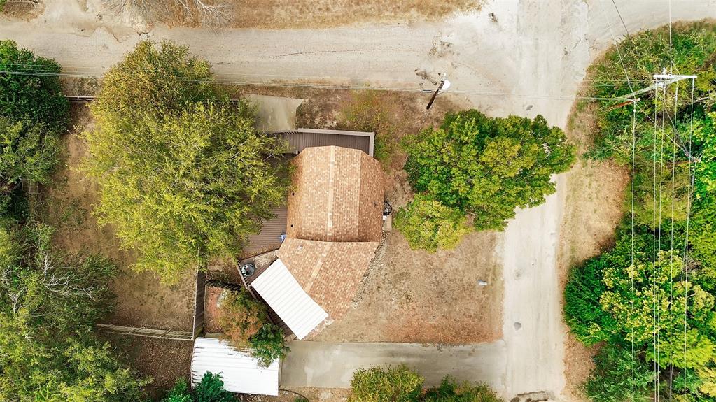 159 Catfish Trail Whitney, TX 76692 - Photo 34 of 36 an aerial view of a house with a yard