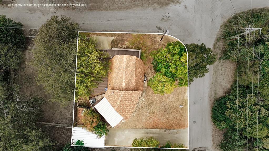 159 Catfish Trail Whitney, TX 76692 - Photo 35 of 36 an aerial view of a house with a yard