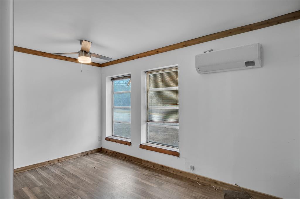 159 Catfish Trail Whitney, TX 76692 - Photo 7 of 36 a view of an empty room with a window
