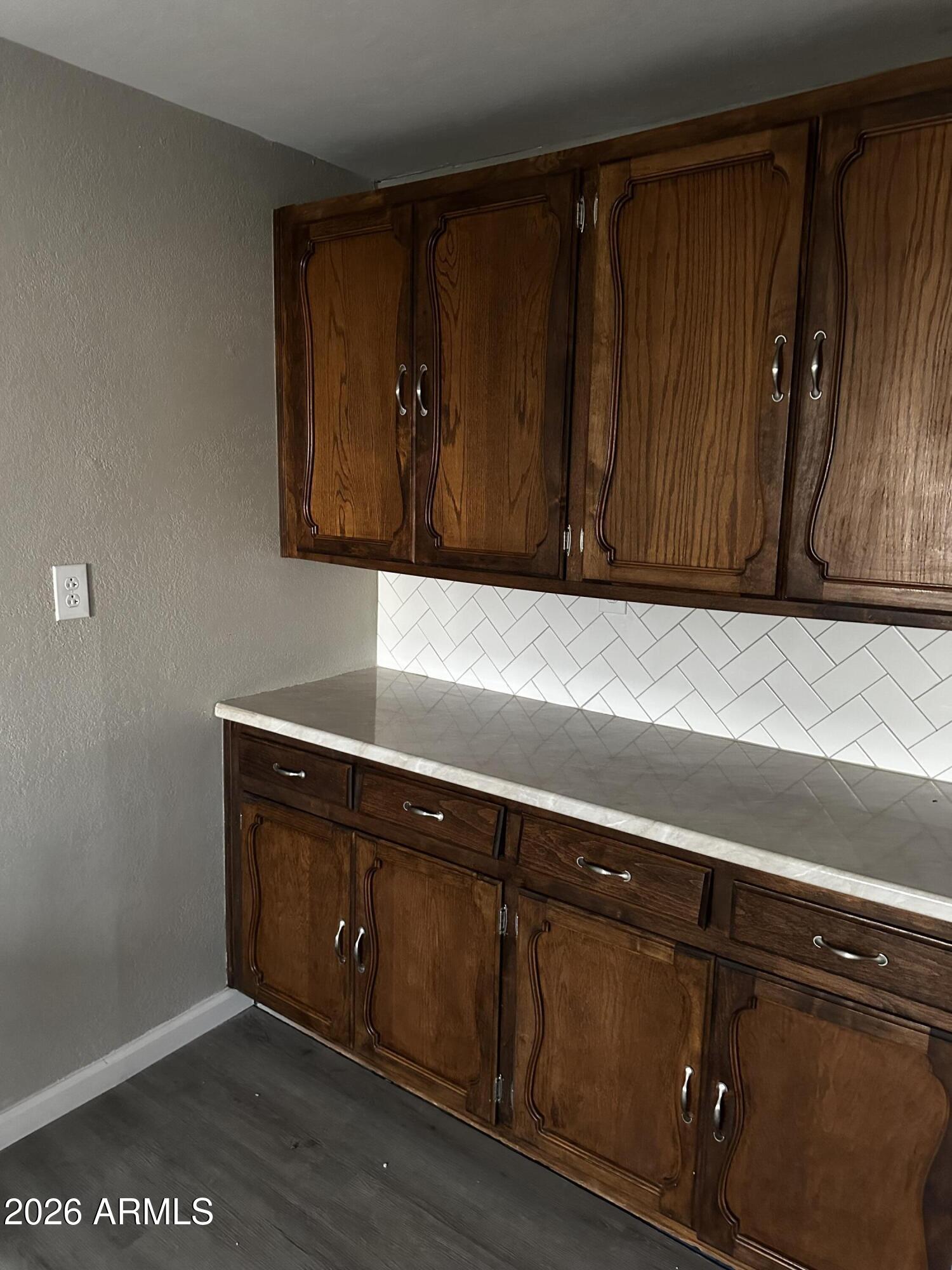 217 East 21st Street Douglas, AZ 85607 - Photo 8 of 22 a view of wooden cabinets