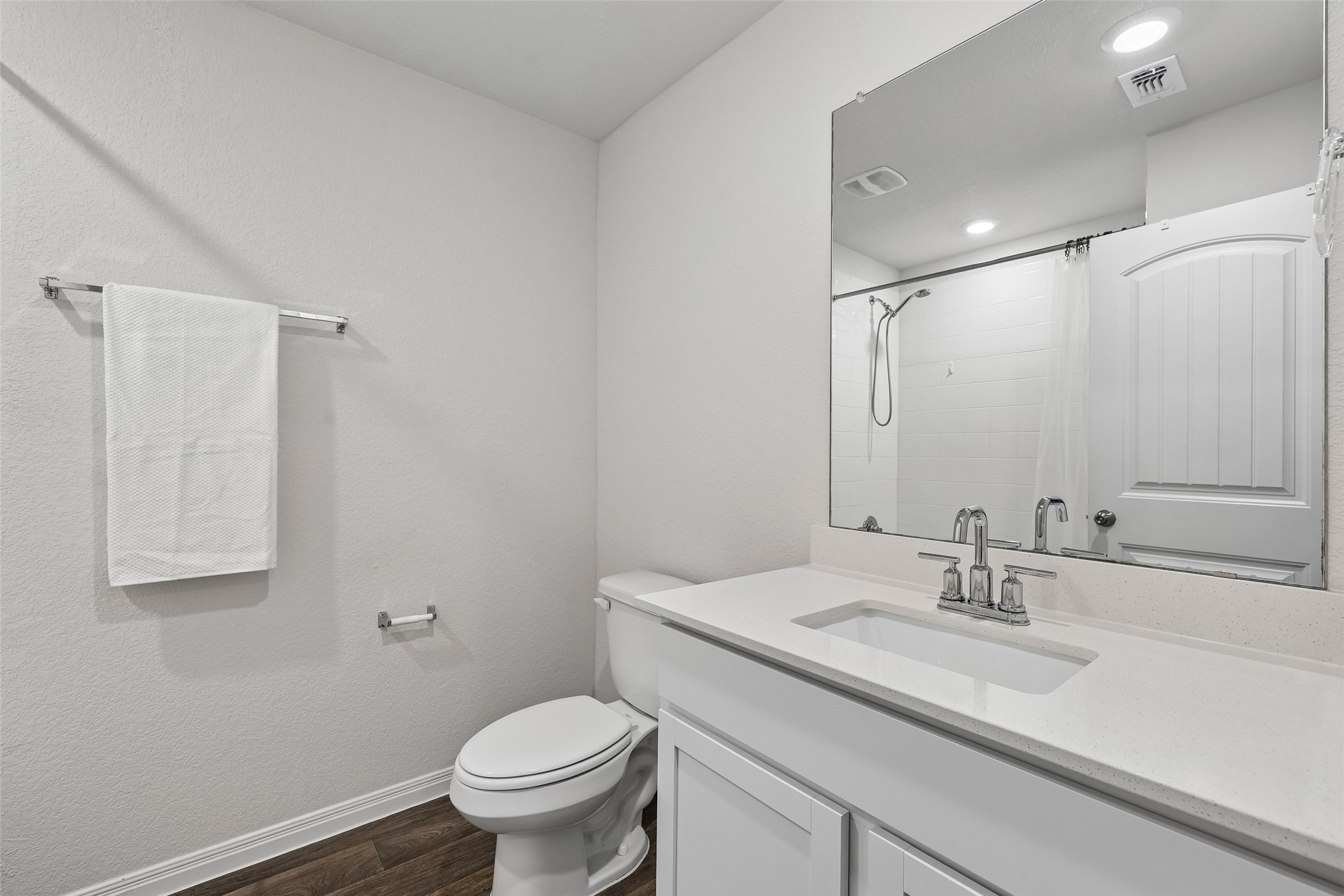 19805 Abigail Fillmore Road Manor, TX 78653 - Photo 22 of 40 A well-appointed bath features a sleek vanity, chrome fixtures, and a shower with clean white tile.
