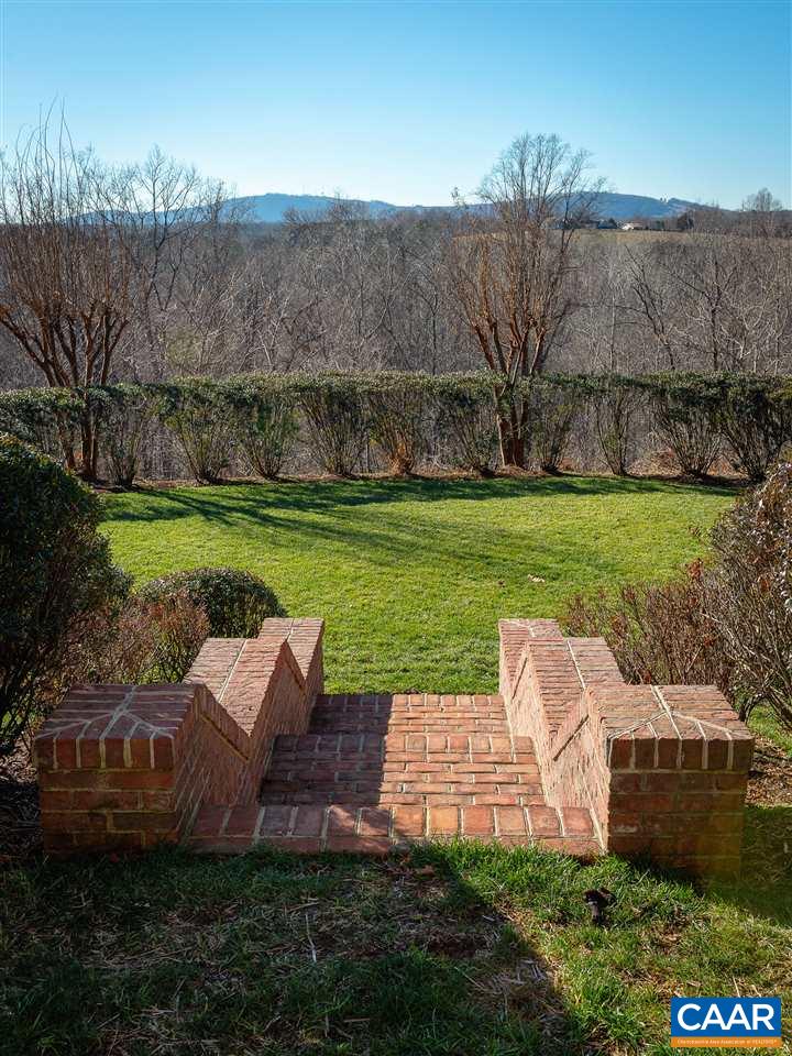 3072 Darby Road Keswick, VA 22947 - Photo 4 of 48 a view of a garden with lawn chairs