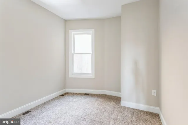 an empty room with a window