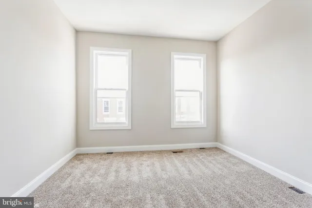 an empty room with a window