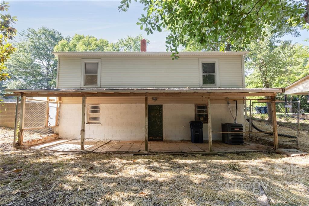 304 West Poplar Street Stanley, NC 28164 - Photo 21 of 21 a view of a house with a yard
