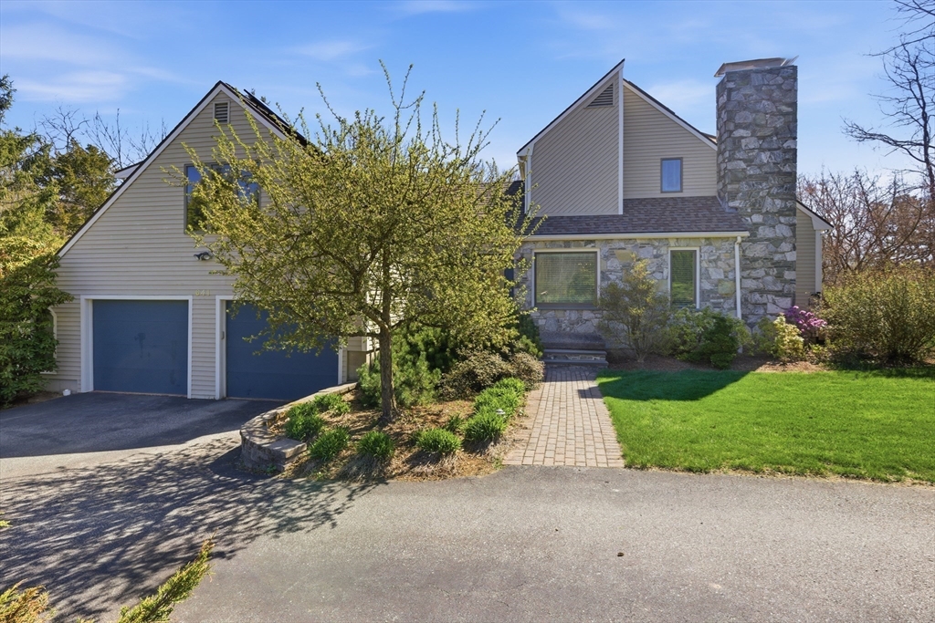 641 Salem End Road Framingham, MA 01702 - Photo 1 of 42 a front view of a house with garden