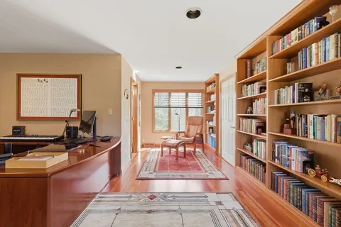 a view of a kitchen with kitchen island dining table and chairs