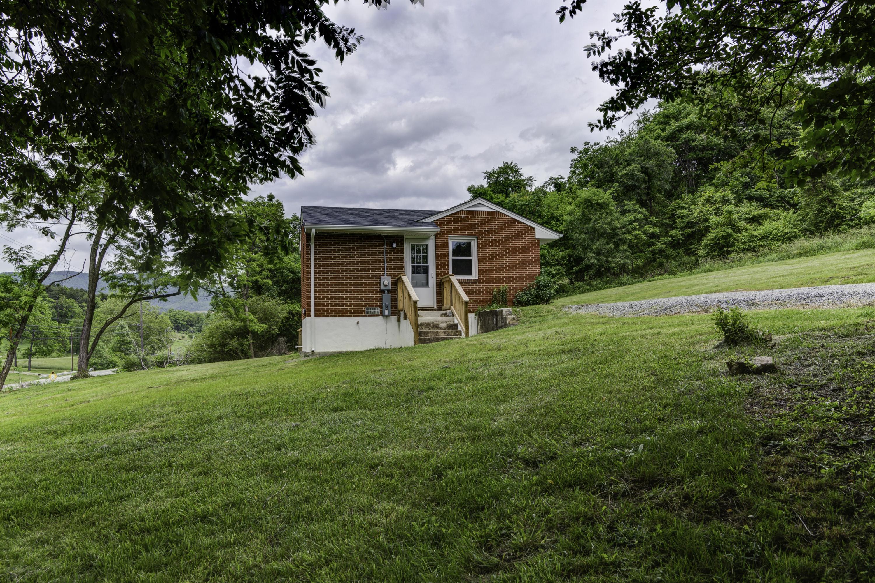 4600 Blue Ridge Boulevard Blue Ridge, VA 24064 - Photo 21 of 27 a view of a house with a backyard