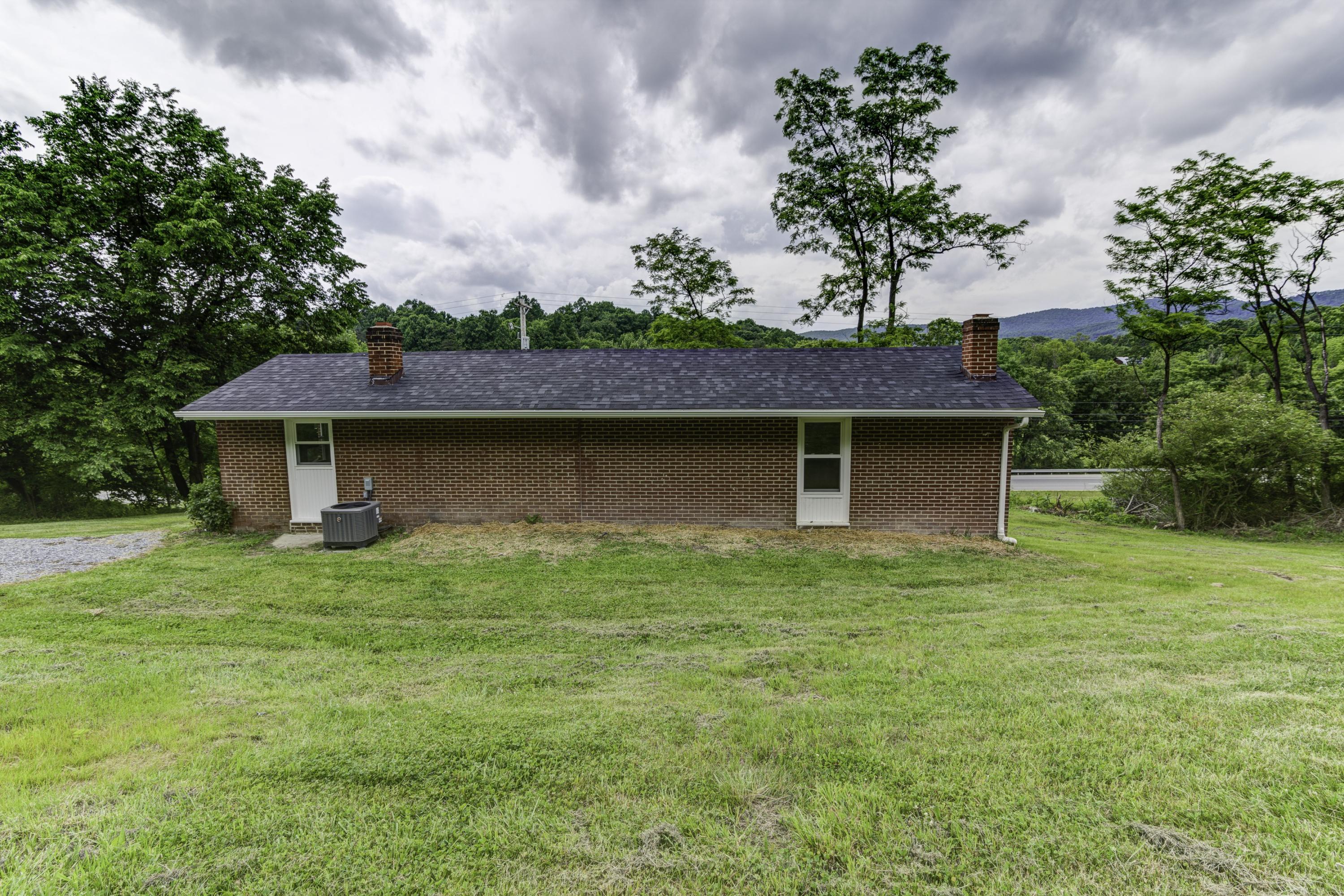 4600 Blue Ridge Boulevard Blue Ridge, VA 24064 - Photo 25 of 27 a front view of a house with garden