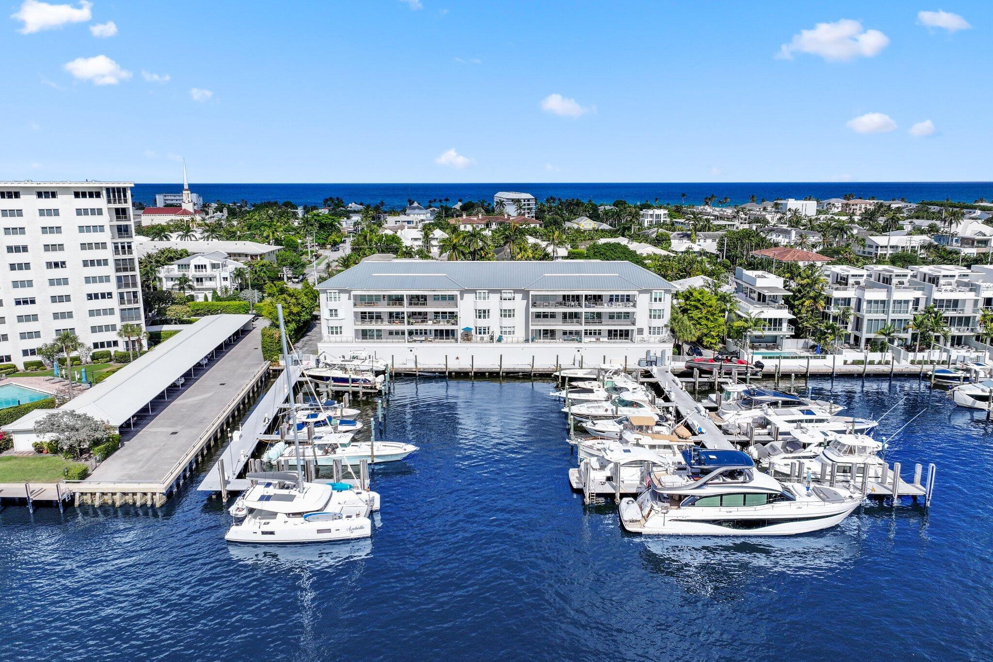 100 Mac Farlane Drive, Unit 3D Delray Beach, FL 33483 - Photo 1 of 57 a view of a ocean with city from a balcony