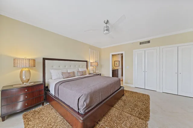 a spacious bathroom with a granite countertop sink mirror and a