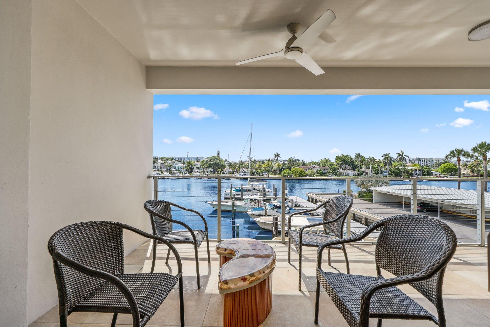 100 Mac Farlane Drive, Unit 3D Delray Beach, FL 33483 - Photo 43 of 57 a view of a chairs and table in the terrace