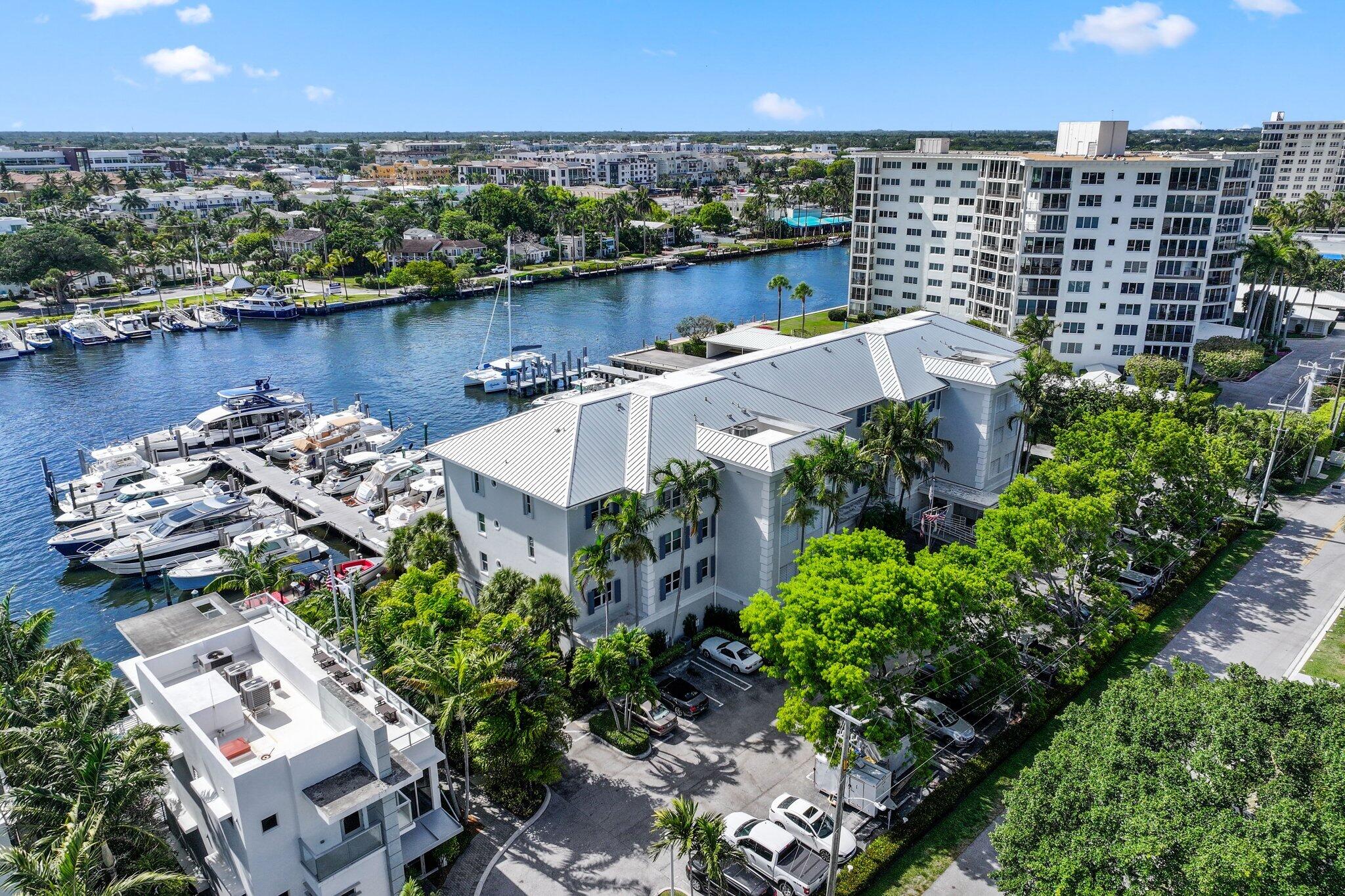 100 Mac Farlane Drive, Unit 3D Delray Beach, FL 33483 - Photo 55 of 57 an aerial view of a house with a lake view