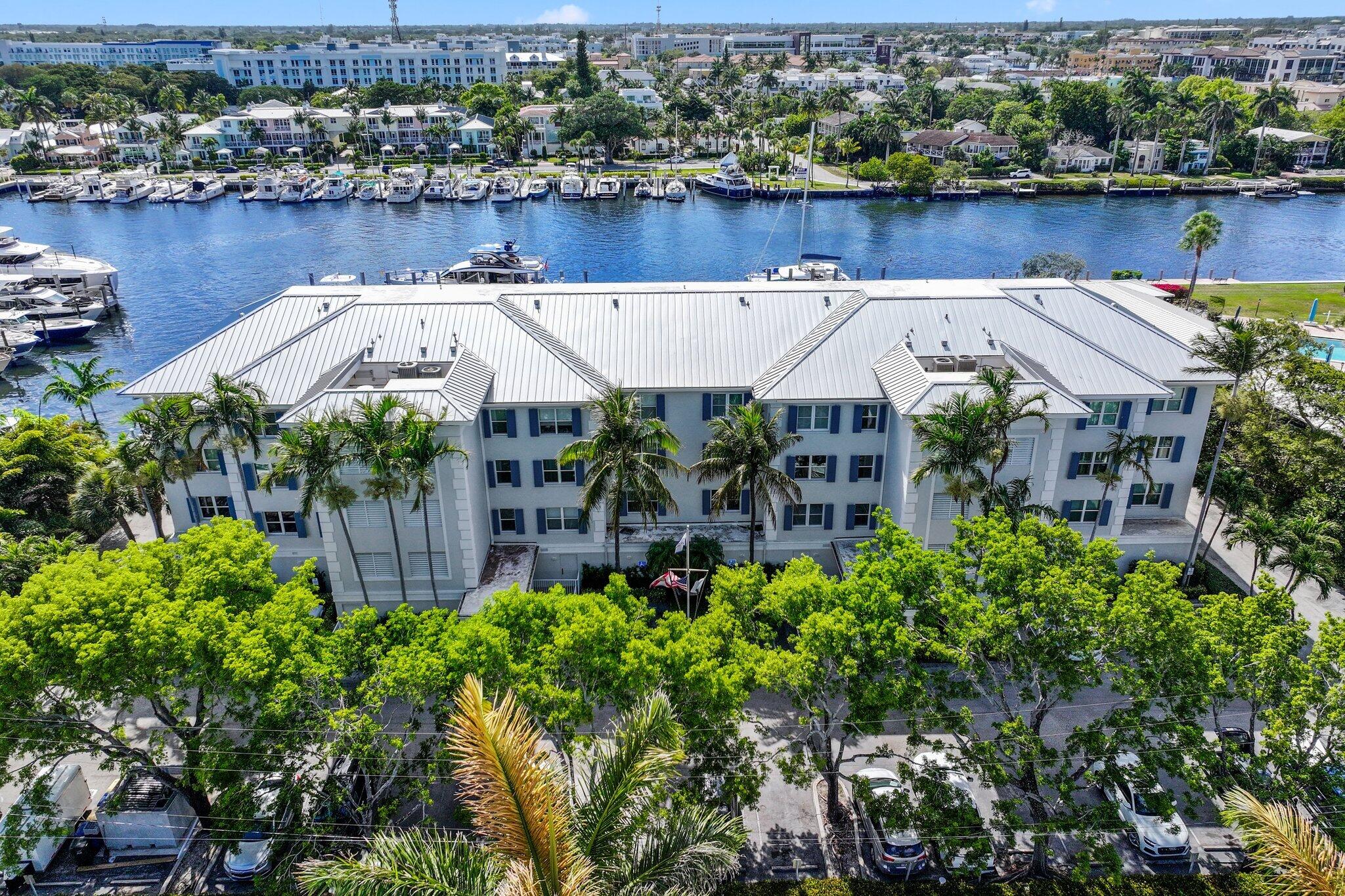 100 Mac Farlane Drive, Unit 3D Delray Beach, FL 33483 - Photo 56 of 57 an aerial view of a house with a lake view