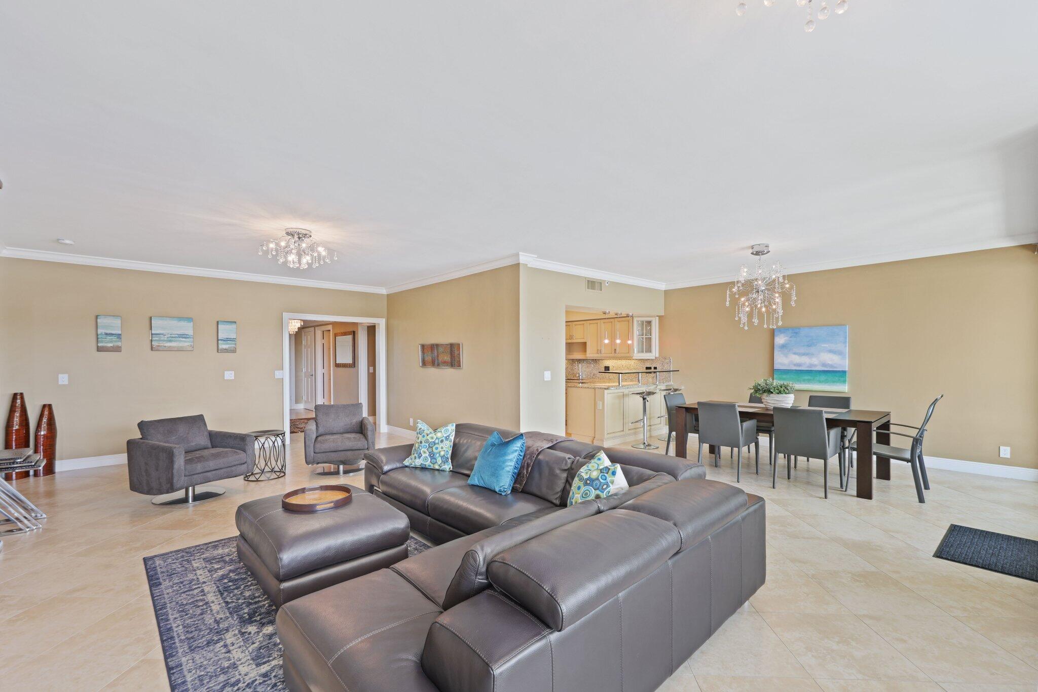 100 Mac Farlane Drive, Unit 3D Delray Beach, FL 33483 - Photo 10 of 57 a living room with furniture kitchen view and a window