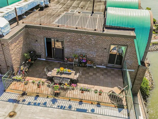 front view of a house with a patio