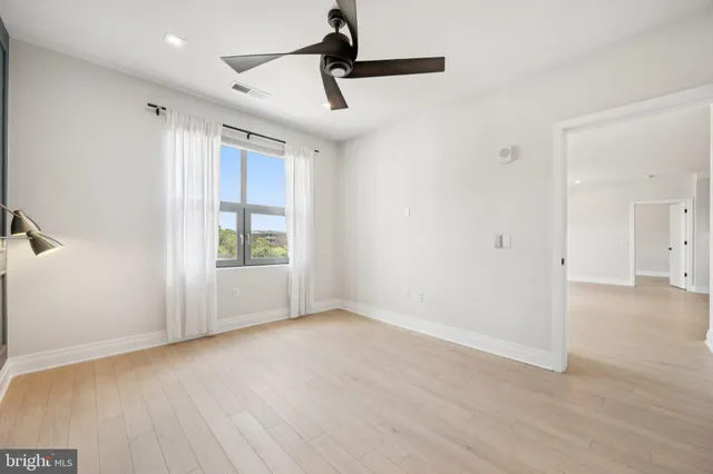 a view of livingroom with hardwood floor and window