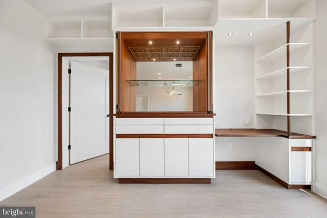 a view of a hallway with front door