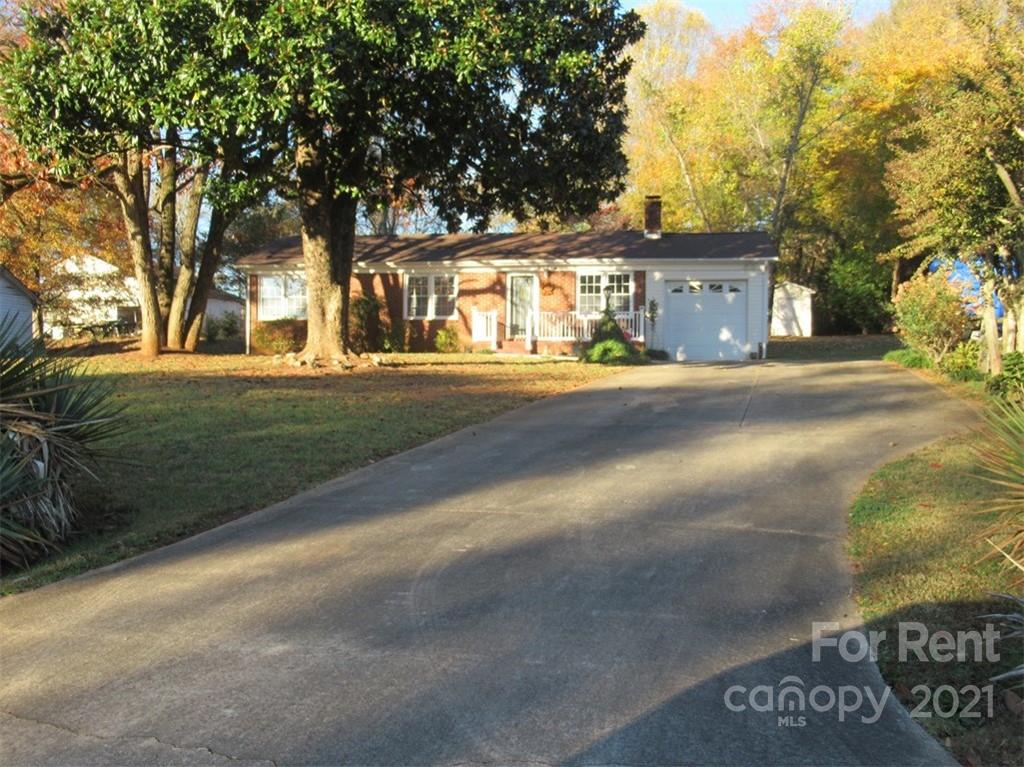 front view of a house with a street