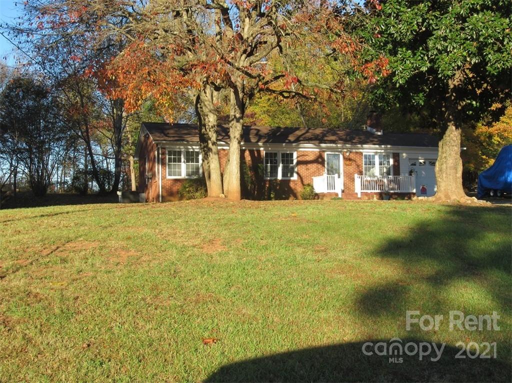 1058 Springdale Drive Maiden, NC 28650 - Photo 3 of 21 a view of a yard with plants and trees