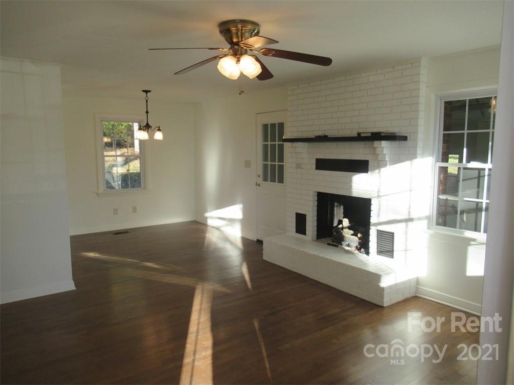 1058 Springdale Drive Maiden, NC 28650 - Photo 4 of 21 a living room with furniture and a fireplace