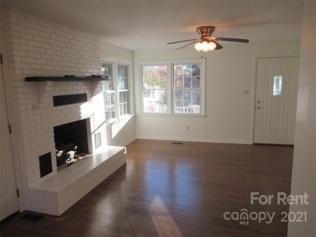 1058 Springdale Drive Maiden, NC 28650 - Photo 5 of 21 a view of a livingroom with furniture window fireplace