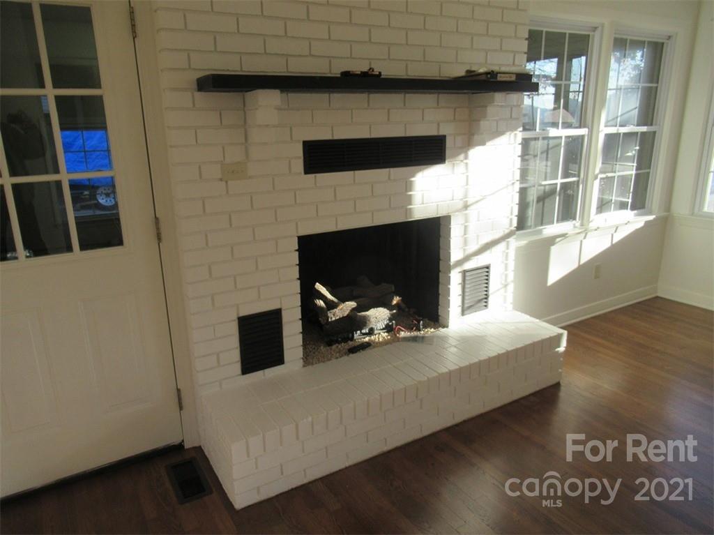 1058 Springdale Drive Maiden, NC 28650 - Photo 7 of 21 a living room with furniture and a fireplace