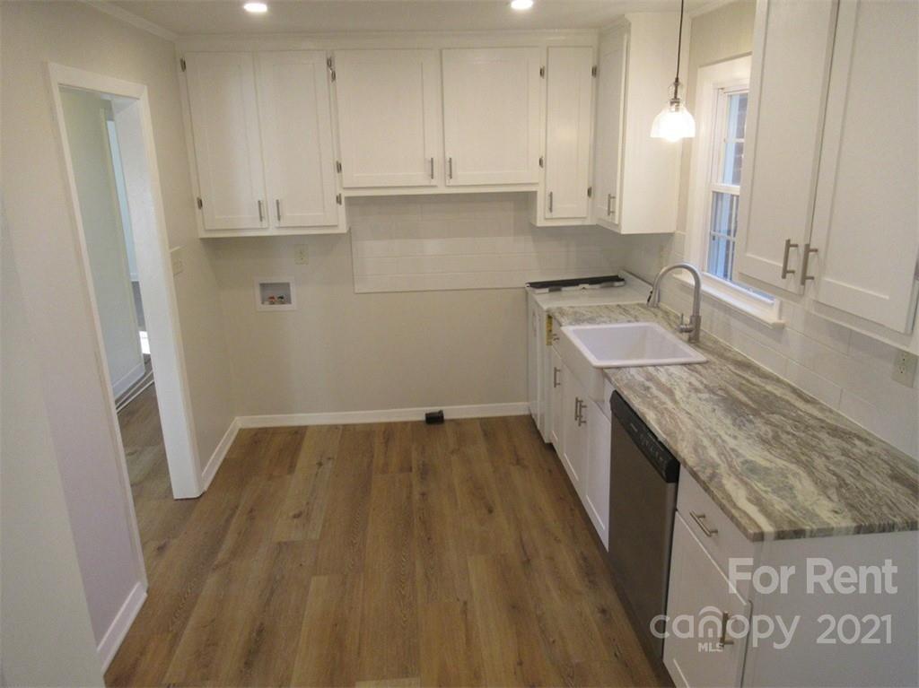 1058 Springdale Drive Maiden, NC 28650 - Photo 9 of 21 a view of a kitchen with a sink and dishwasher