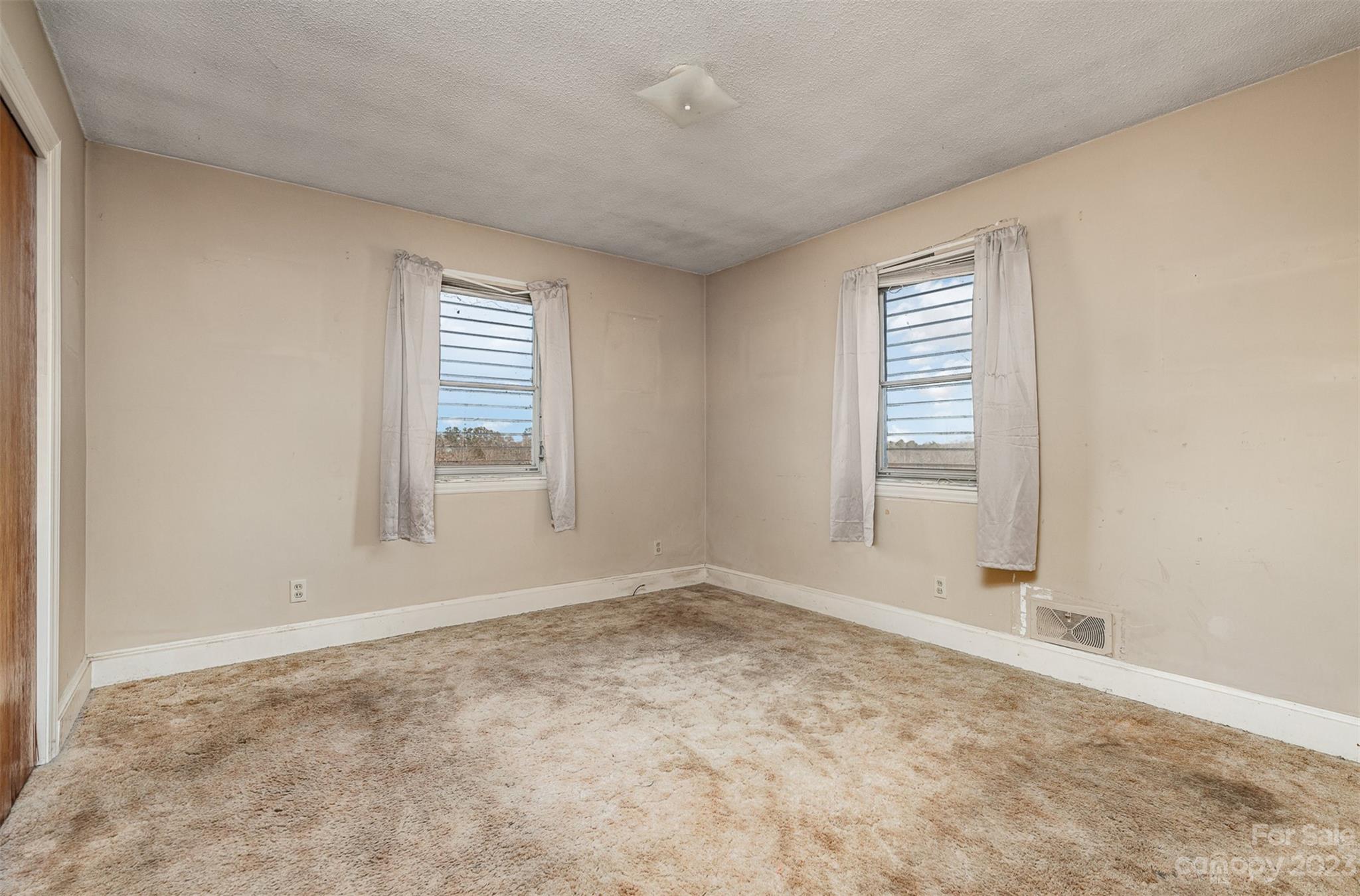 2765 Long Circle Iron Station, NC 28080 - Photo 14 of 26 an empty room with windows