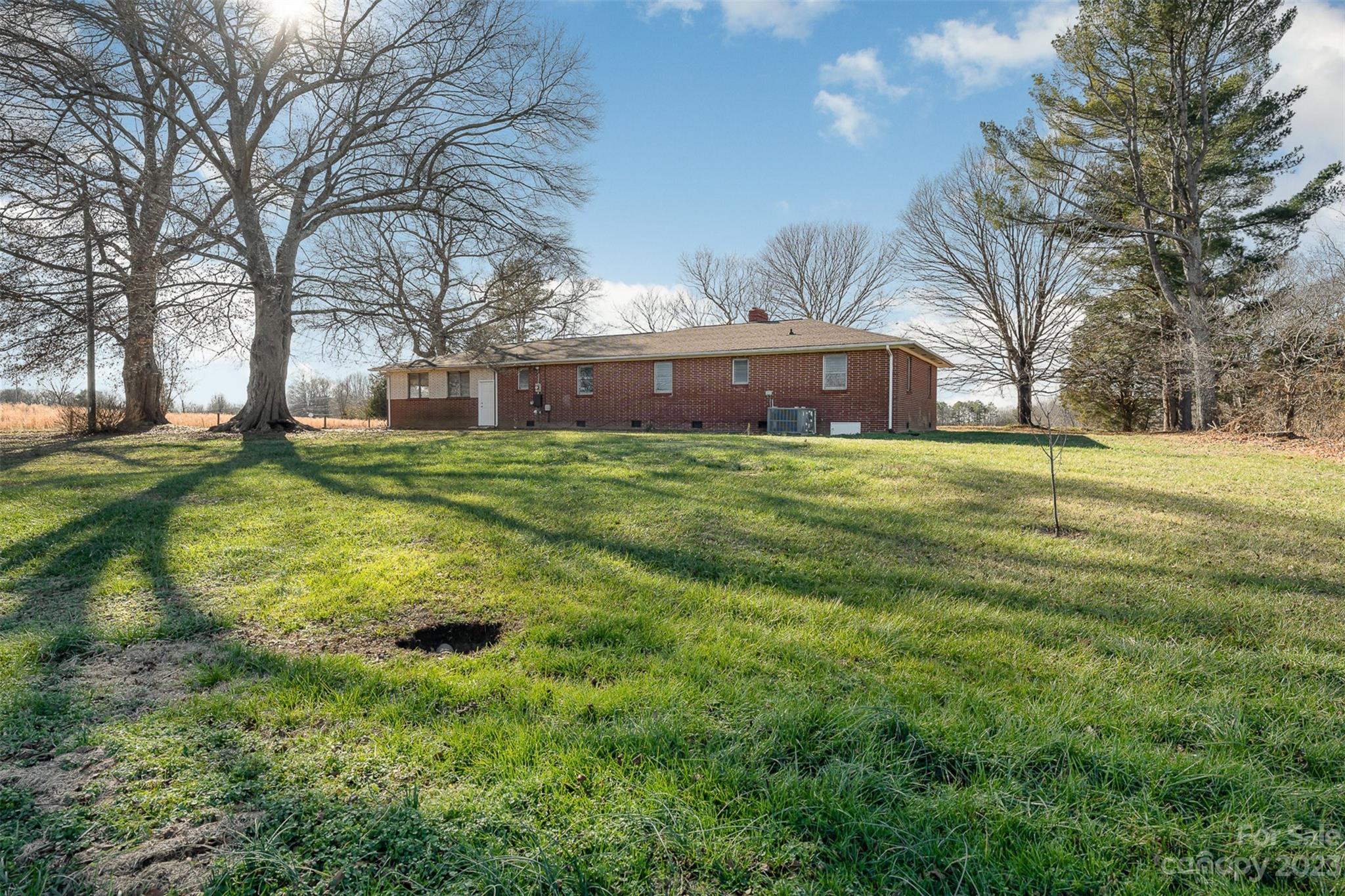 2765 Long Circle Iron Station, NC 28080 - Photo 2 of 26 a front view of house with yard and green space
