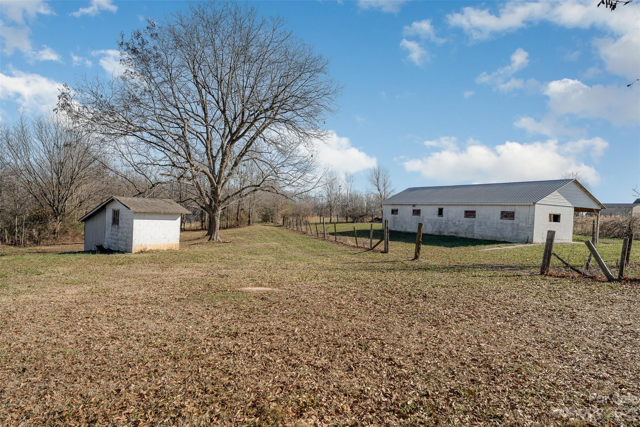 2765 Long Circle Iron Station, NC 28080 - Photo 5 of 26 a view of a house with a yard
