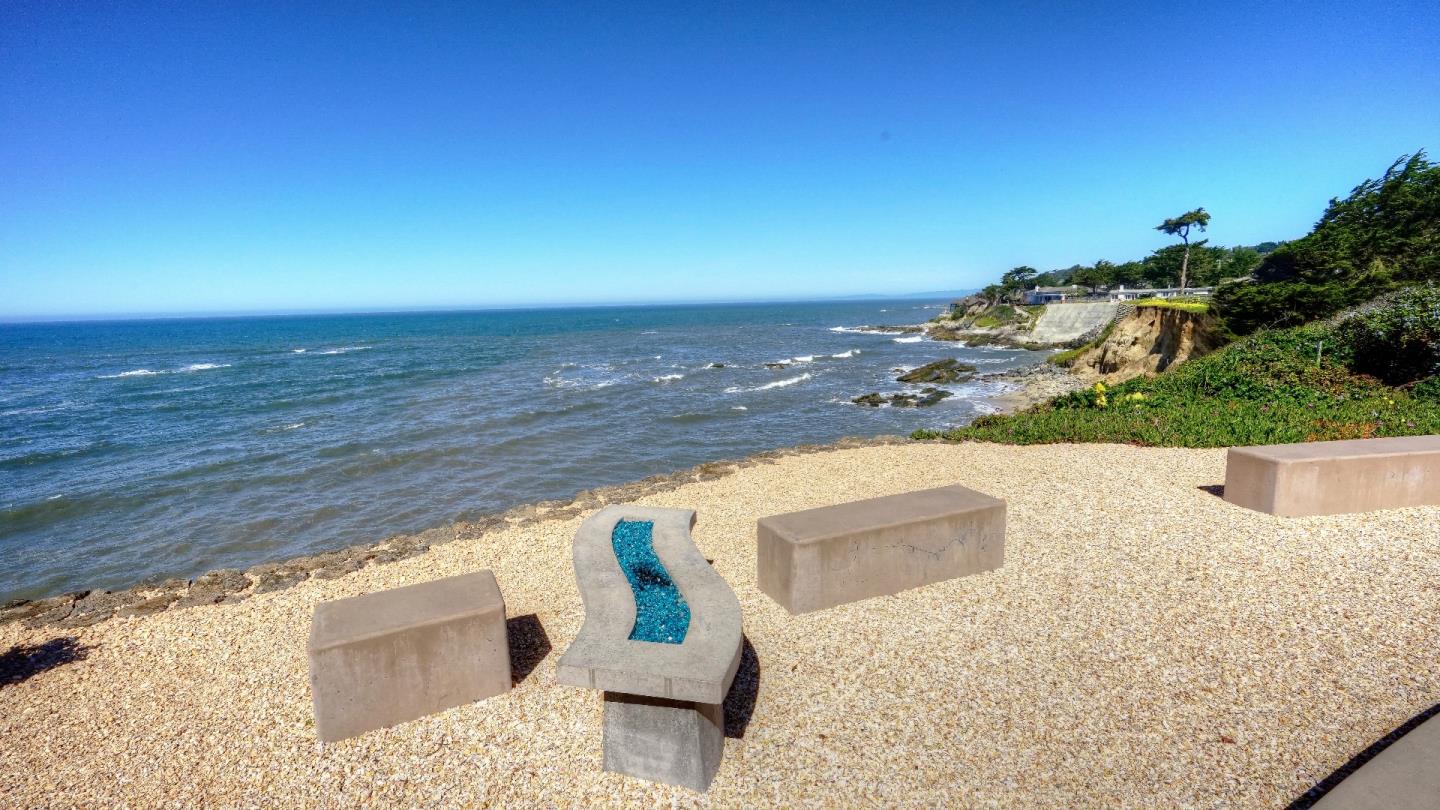 97 Beach Street Moss Beach, CA 94038 - Photo 13 of 43 a view of an ocean from a balcony