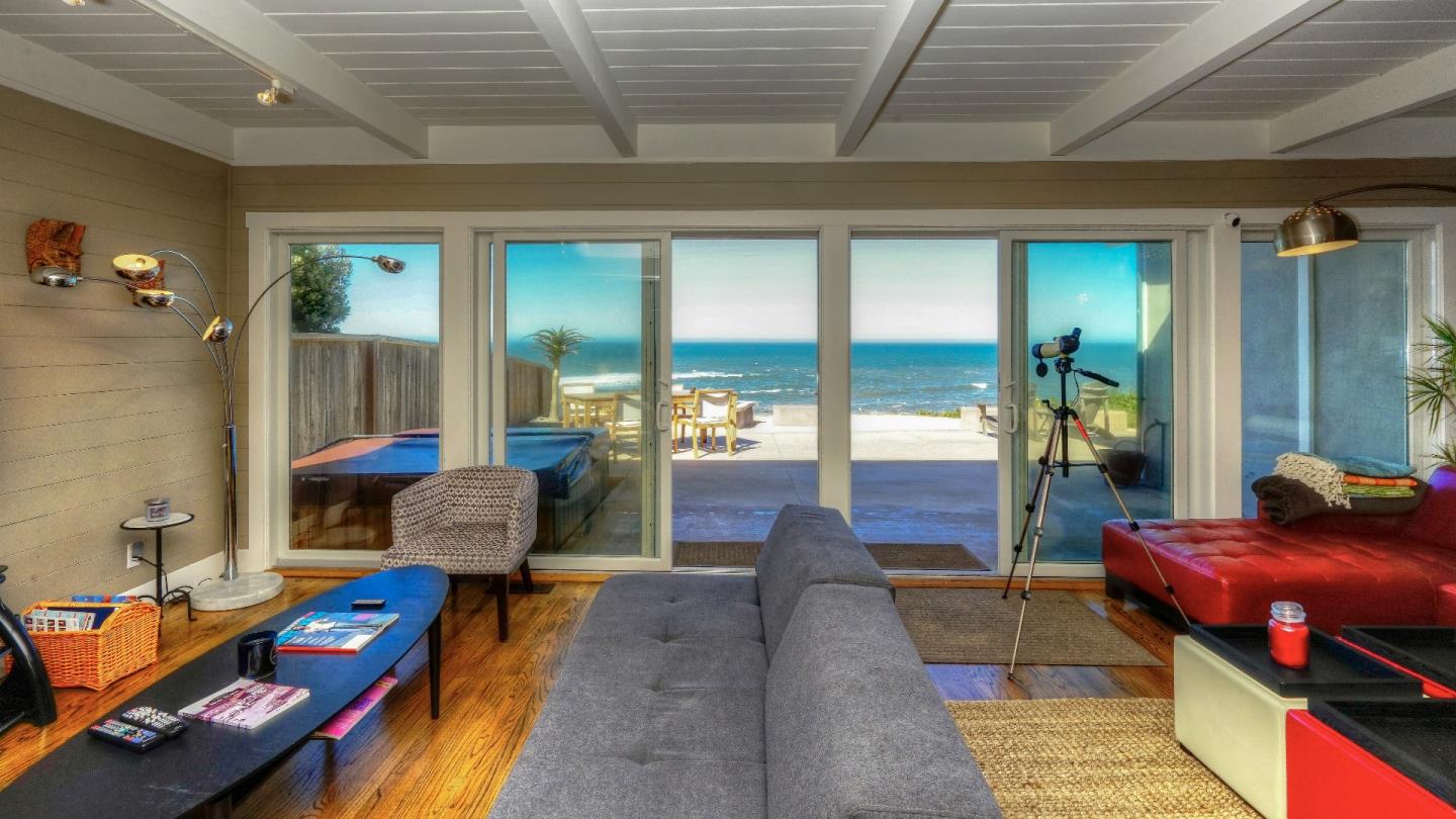 97 Beach Street Moss Beach, CA 94038 - Photo 20 of 43 a living room with furniture
