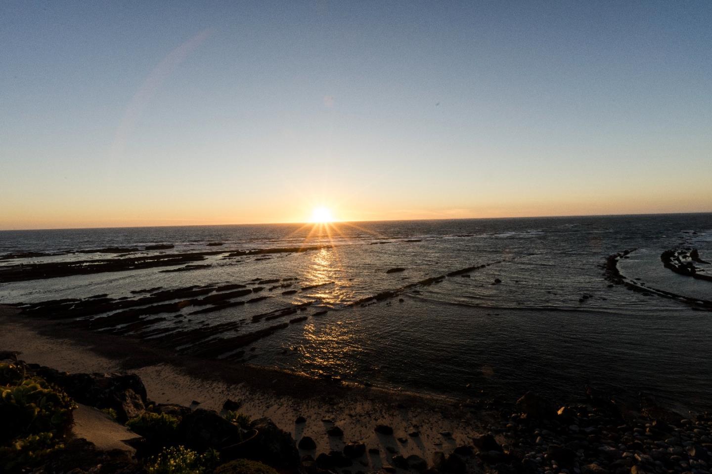 97 Beach Street Moss Beach, CA 94038 - Photo 4 of 43 a view of an ocean