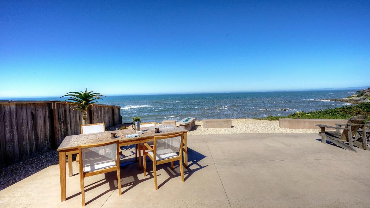 97 Beach Street Moss Beach, CA 94038 - Photo 9 of 43 a dining room with furniture and wooden floor