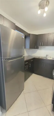 a utility room with a sink